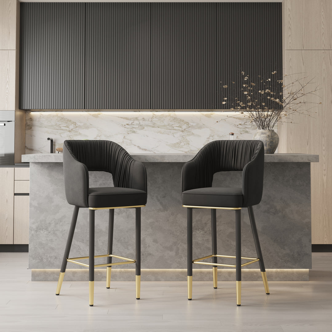 Elevate your space with this modern black velvet bar stool, featuring a sleek low back