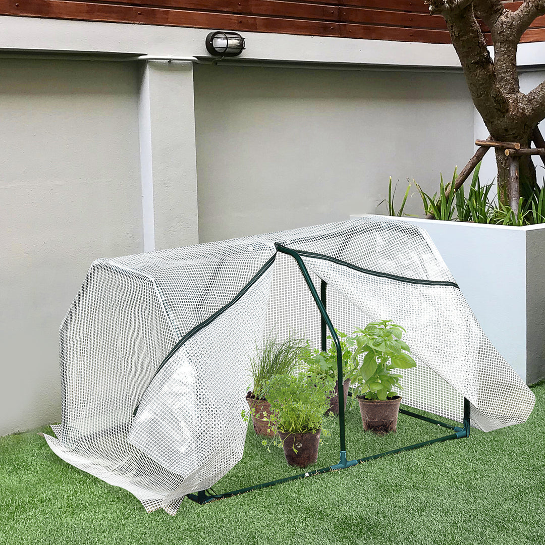 Portable Greenhouse Oasis: Mini Metal Frame with PVC Cover